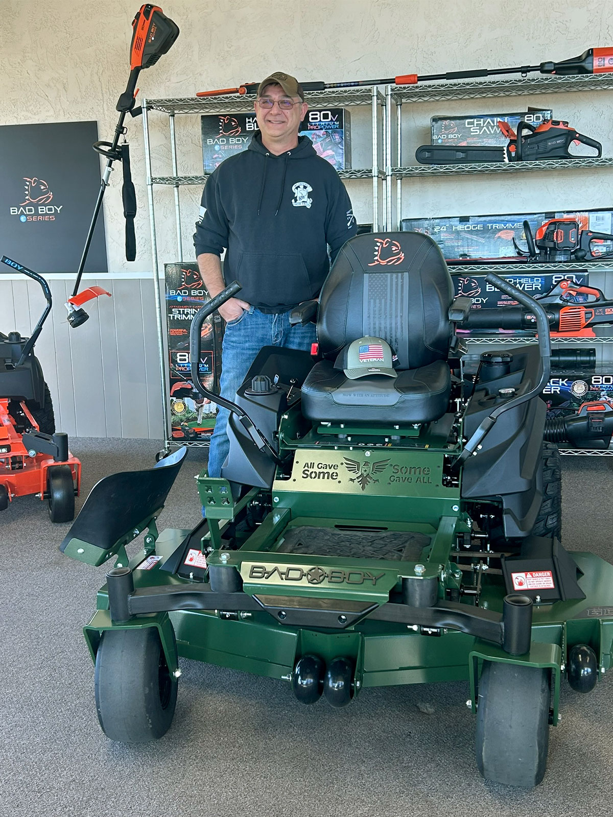Tim Coleman receives his custom Bad Boy ZT Elite mower during a special presentation celebrating his 
military service.
